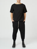 Black Ribbed Joggers
Details:
Black cotton  trousers 
drawstring-waist black 
contrast string 
ribbed edge
side pockets 
elastic waistband can fit  easily fit in between sizes 
CompositPantsAlchemy The LabelAlchemy The LabelBlack Ribbed Joggers