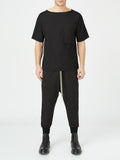 Black Stitch Detail Joggers
Details:
Black ribbed edge  joggers 
drawstring-waist black trousers 
white stitch detail 
side pockets 
elastic waistband can easily fit in between sizes 
CompositPantsAlchemy The LabelAlchemy The LabelBlack Stitch Detail Joggers