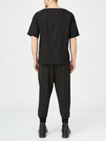 Black Stitch Detail Joggers
Details:
Black ribbed edge  joggers 
drawstring-waist black trousers 
white stitch detail 
side pockets 
elastic waistband can easily fit in between sizes 
CompositPantsAlchemy The LabelAlchemy The LabelBlack Stitch Detail Joggers