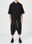 Hooded Jersey Top 
Details: 
Black cotton jersey T-Shirt
great staple, easy to style 
complete the look with harem trousers
short sleeve 
hood 
ribbed neckline 
adjustable hem 
CompoShirts & TopsAlchemy The LabelAlchemy The LabelHooded Jersey Top