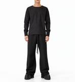 Slightly flared loose trousers